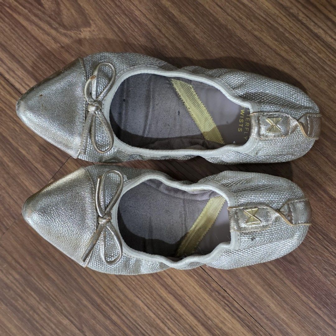 Ballet Flats Butterfyl Twists Gold (Category: Flats & Sandals) located in Manila. Submitted by my23686 (Listing ID 1463632292, Image 1). Description: - Gold ballet flats from Butterfly Twists - Chic pointed toe with a cute bow detail - Elasticated sides ensure a snug and comfortable fit - Effortless slip-on design for convenience - Ideal for everyday wear and travel.