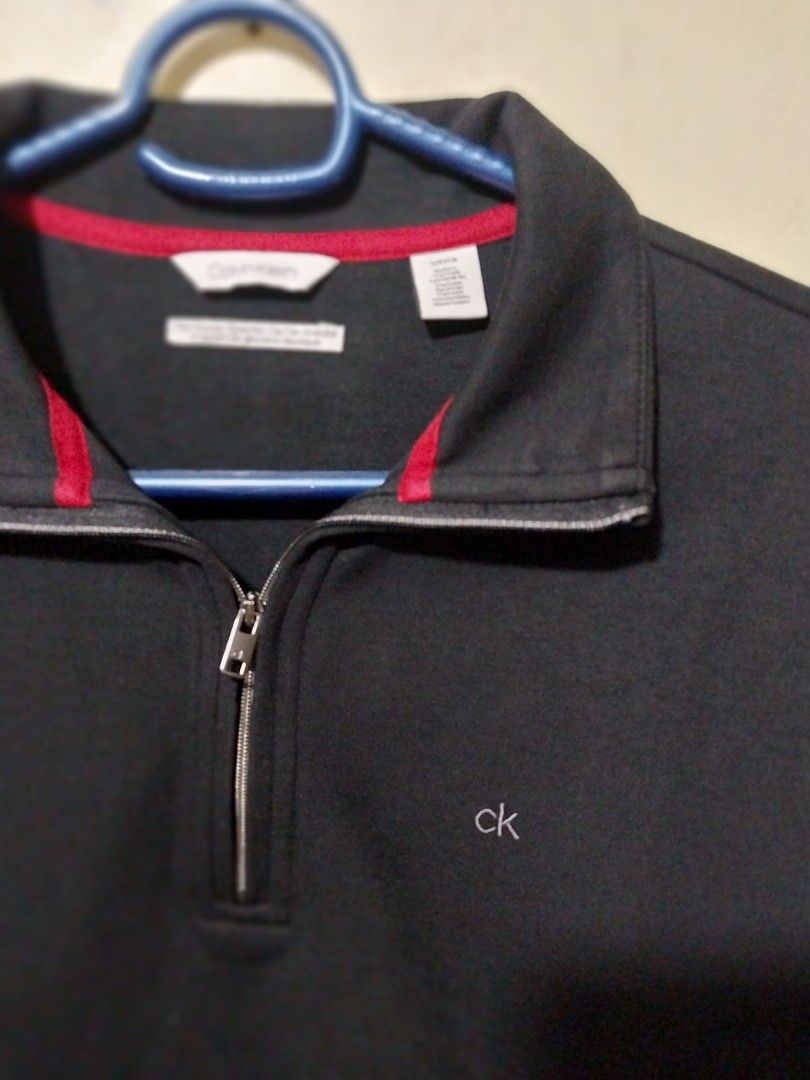 Calvin Klein Black quarterZip Sweatshirt (Category: Coats, Jackets and Outerwear) located in Manila. Submitted by PrinceDani.Clothing (Listing ID 1463710485, Image 2). Description: Calvin klein black quarter zip sweater small 20in width 27in length excellent condition .