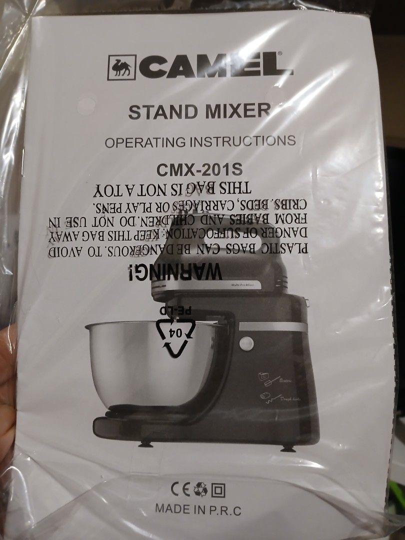 Camel Stand Mixer CMX-201S Operating Instructions (Category: Hand & Stand Mixers) located in Quezon City. Submitted by mapanak24 (Listing ID 1463558298, Image 1). Description: - Camel Stand Mixer Model: CMX-201S - Important: Please review all operating instructions and safety warnings before use. - Special warning included regarding plastic bag. - Product made in P.R.C..