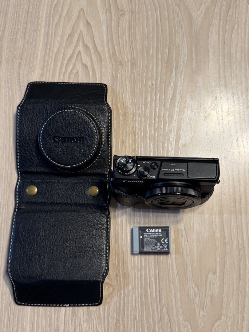 Canon G7X MarkIII (Category: Cameras) located in Pasig City. Submitted by muezam (Listing ID 1463715965, Image 2). Description: - Comes with a black leather case - with battery - NO charger & SD card *WAG NA BARATIN*.