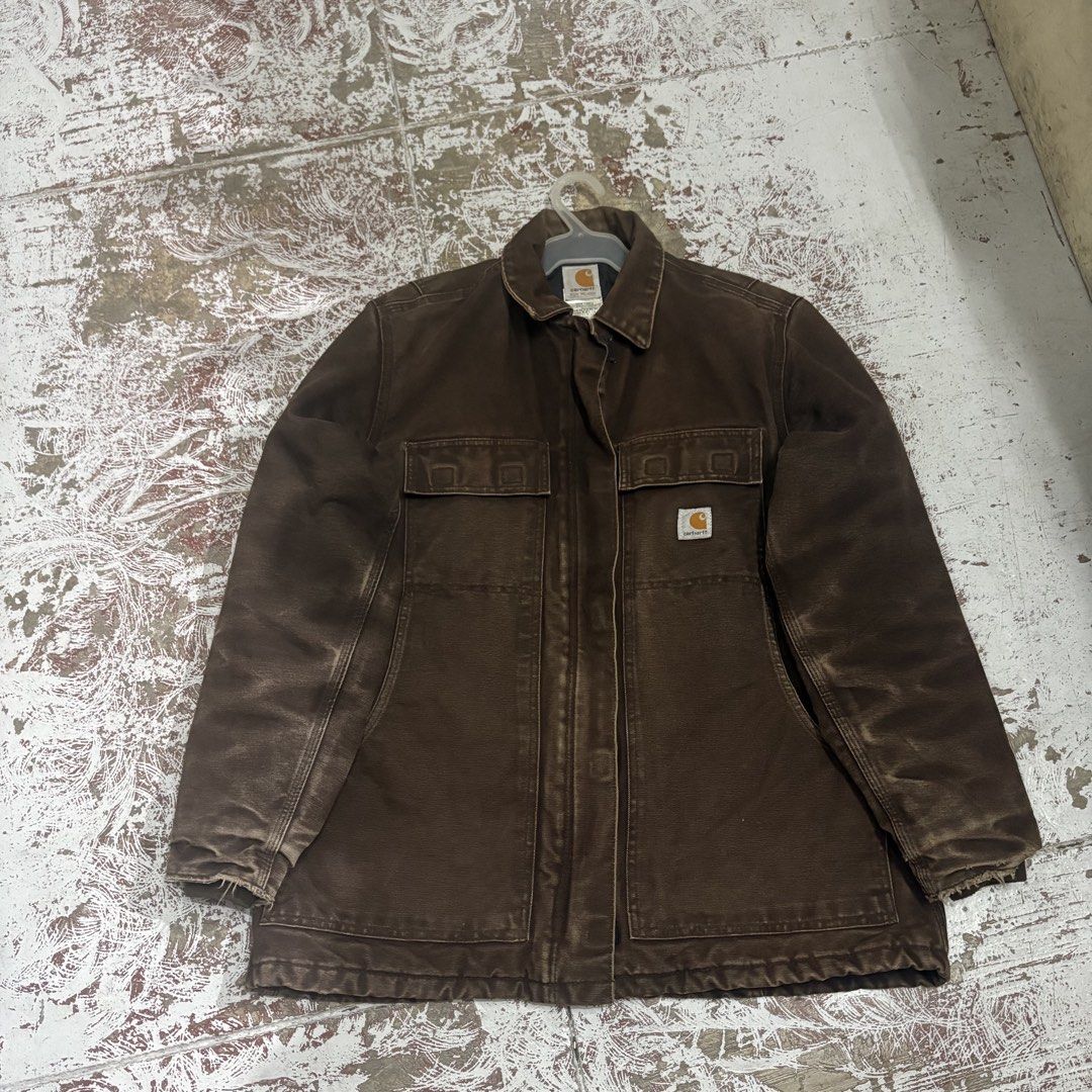 Carhartt For Women Brown Canvas Work Jacket (Category: Coats, Jackets and Outerwear) located in Ajuy. Submitted by reeyn0515 (Listing ID 1463578850, Image 1). Description: - Brand: Carhartt - Color: Brown - Style: Work Jacket - Material: Durable Cotton Duck Canvas - Lining: Quilted for warmth - Pockets: 2 chest pockets, 2 hand pockets - Closure: Zipper and snap - Size: Medium - Ideal for: Work or everyday wear - 23x27.