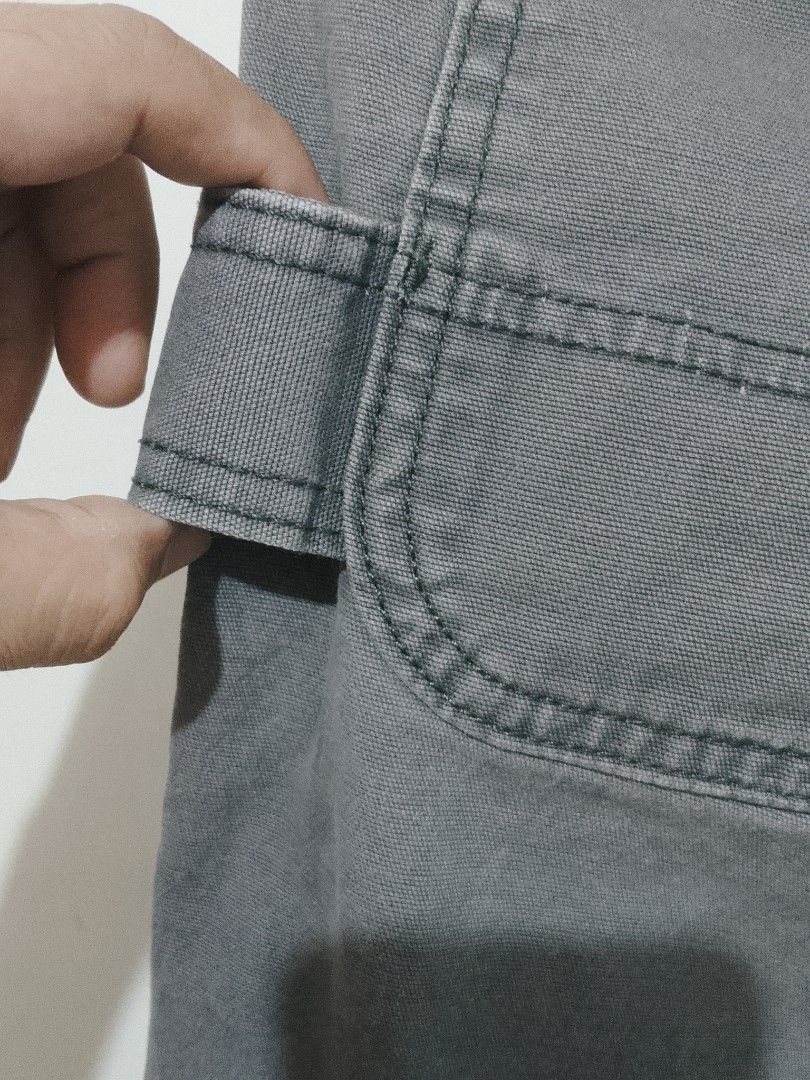 Carhartt Slim Fit Work Pants Grey Size 10 Regular (Category: Jeans) located in Manila. Submitted by juan.hundred04 (Listing ID 1463647520, Image 3). Description: - Grey Carhartt work pants - Slim fit, size 10 regular - Classic carpenter style with multiple pockets - Durable material, suitable for work or casual wear - Made in China.