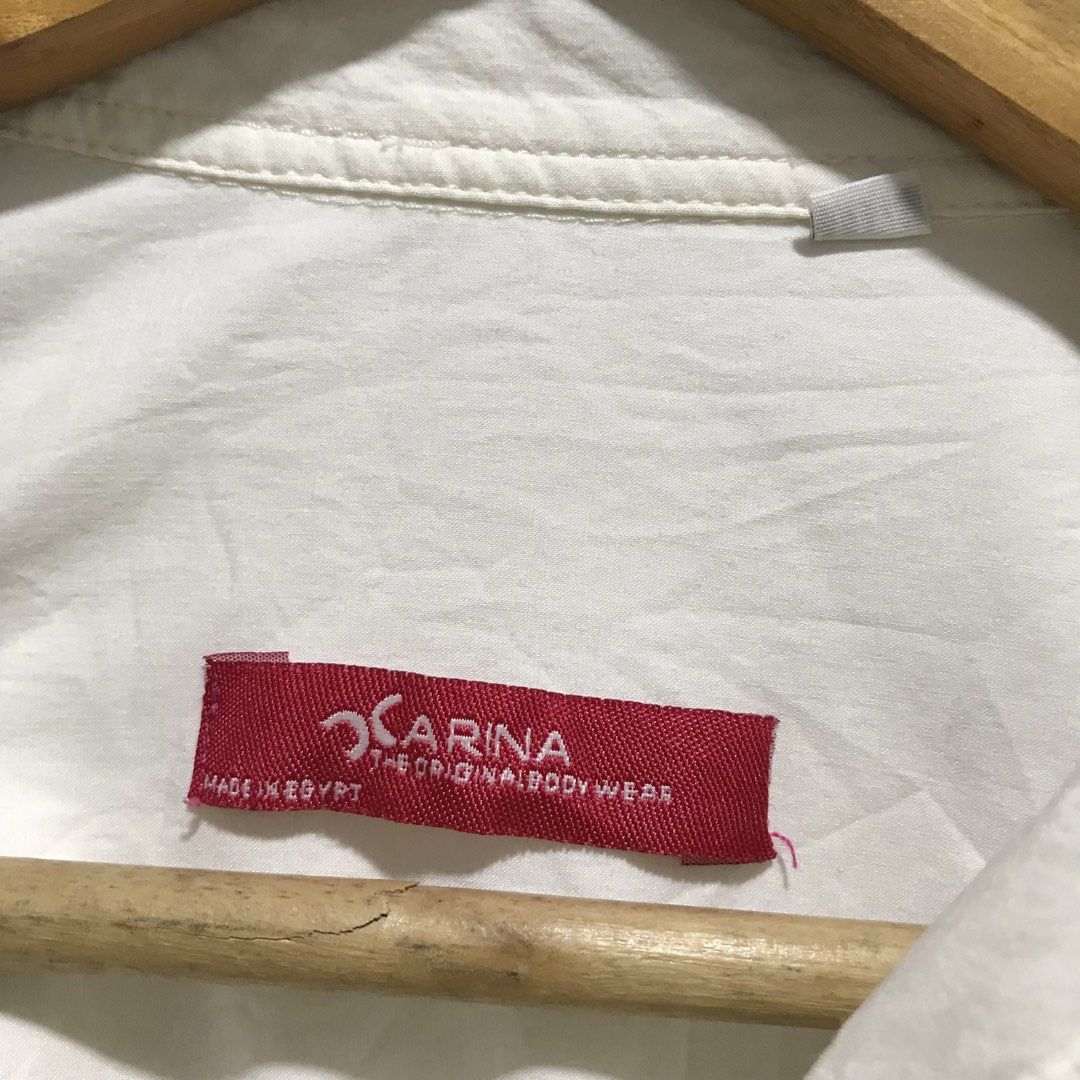 CARINA White Button Down Polo Longsleeve (Category: Longsleeves) located in Cavite. Submitted by tanya.valentin (Listing ID 1463658194, Image 3). Description: - 25x29.