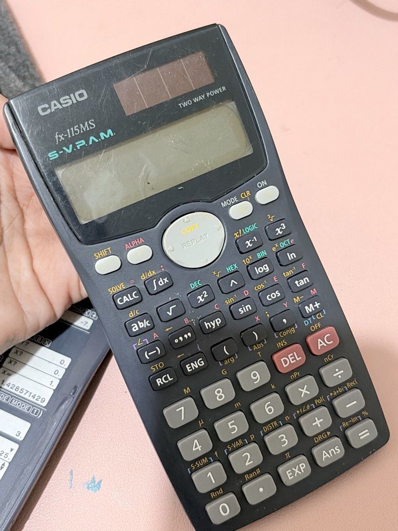 Casio fx-115MS S-V.P.A.M. Scientific Calculator (Category: Office & Business Technology) located in Manila. Submitted by vexie.nyahmmy (Listing ID 1463591518, Image 1). Description: - Casio fx-115MS S-V.P.A.M. Scientific Calculator - Two-way power source - Comes with protective slide-on cover featuring function guides - Ideal for math and science subjects - Tested and confirmed working - Minor cosmetic wear on casing, but screen is clear - All bu