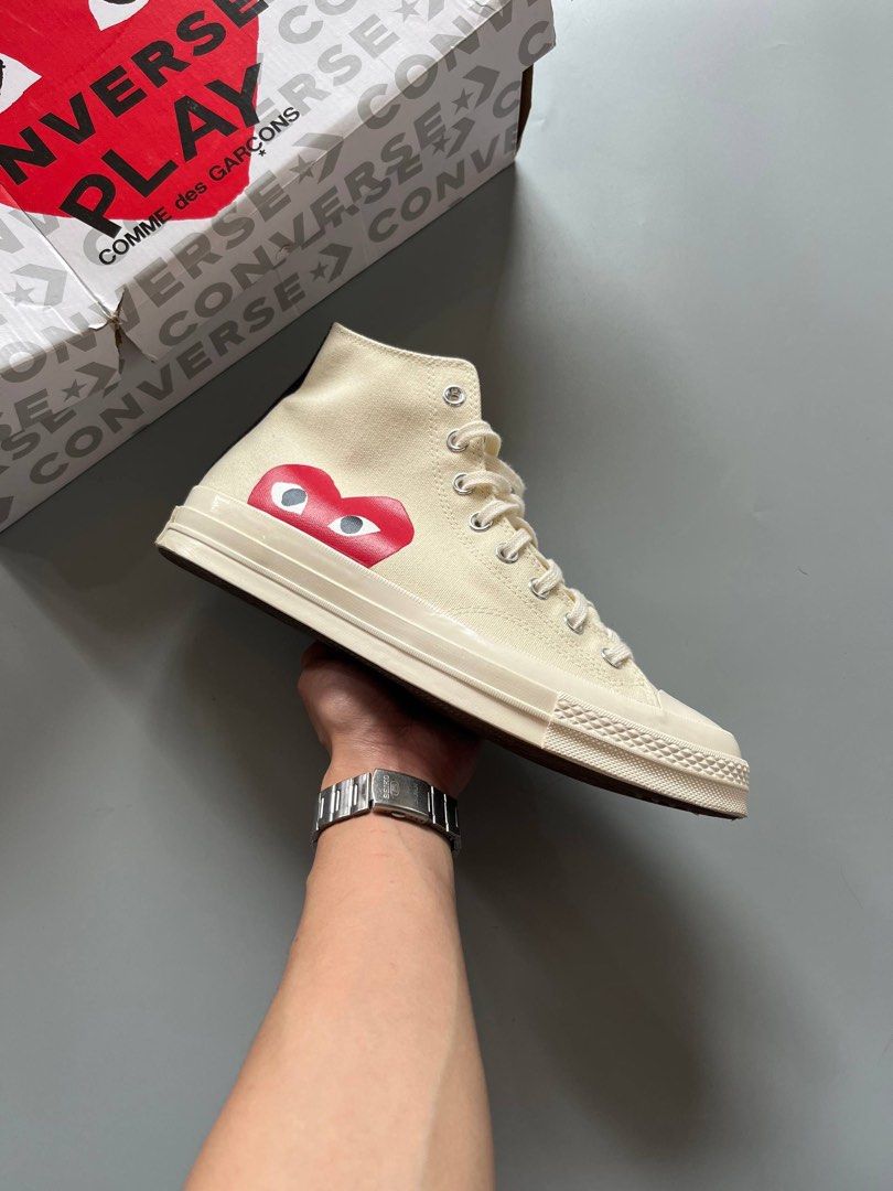 CDG PLAY x CONVERSE HIGH WHITE (10.5-11US) (Category: Sneakers) located in Baguio. Submitted by grabUrPairs (Listing ID 1463696531, Image 1). Description: GOOD AS NEW USED A FEW TIMES 10US fits 10.5-11US WITH BOX AUTHENTIC.