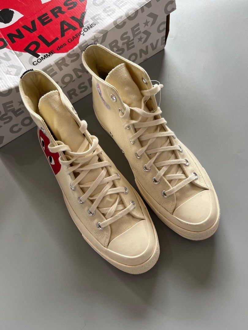 CDG PLAY x CONVERSE HIGH WHITE (10.5-11US) (Category: Sneakers) located in Baguio. Submitted by grabUrPairs (Listing ID 1463696531, Image 2). Description: GOOD AS NEW USED A FEW TIMES 10US fits 10.5-11US WITH BOX AUTHENTIC.