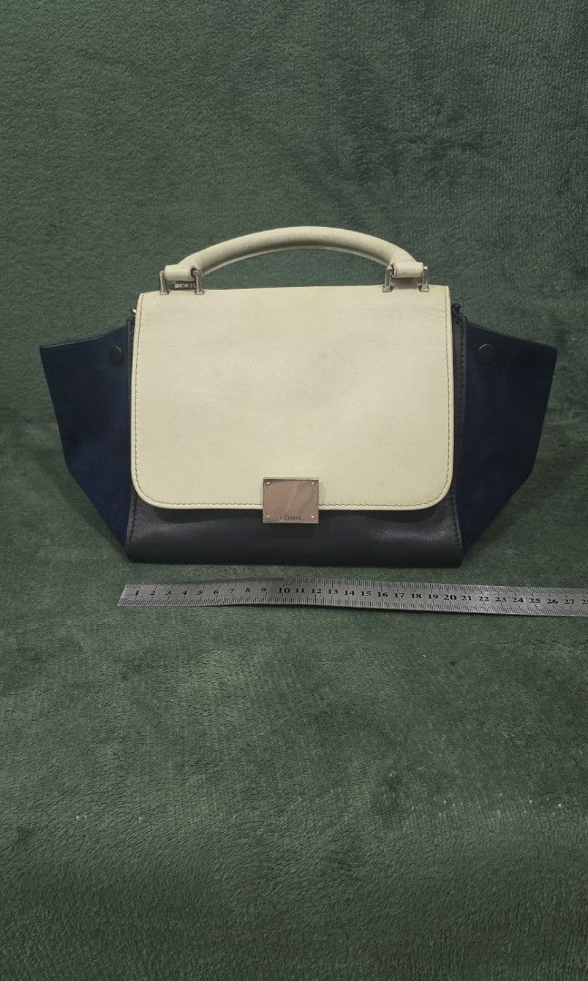 Celine Deep Sea Tricolor Trapeze Bag (Category: Luxury Bags & Wallets) located in Bacoor. Submitted by deux_trading_corporation (Listing ID 1463705253, Image 1). Description: 50k and above on 2ndhand market. condition: Rank AB - has normal signs of wear but no damage whatsoever. needs bags spa. payment first. you can always ask for discount/tawad but no to sobrang barat. no reservation. always check all the photos. some photo/s indicate the flaw.
