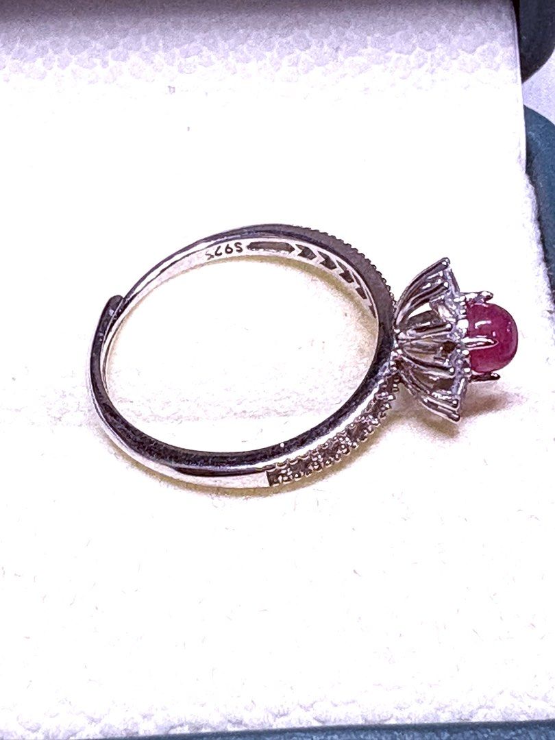 Certified Ruby Ring 💗 (Category: Rings) located in Singapore. Submitted by Discoverme (Listing ID 1463666453, Image 2). Description: Certified Ruby Ring 💗 A rich red-purple ruby takes centre stage, surrounded by sparkling zircon in a delicate starburst design. Set in S925 silver, it’s a lovely piece for everyday elegance or a special occasion. The accompanying certificate identifies the ruby and lists the ring’s total weight as 1.96 g. Personal