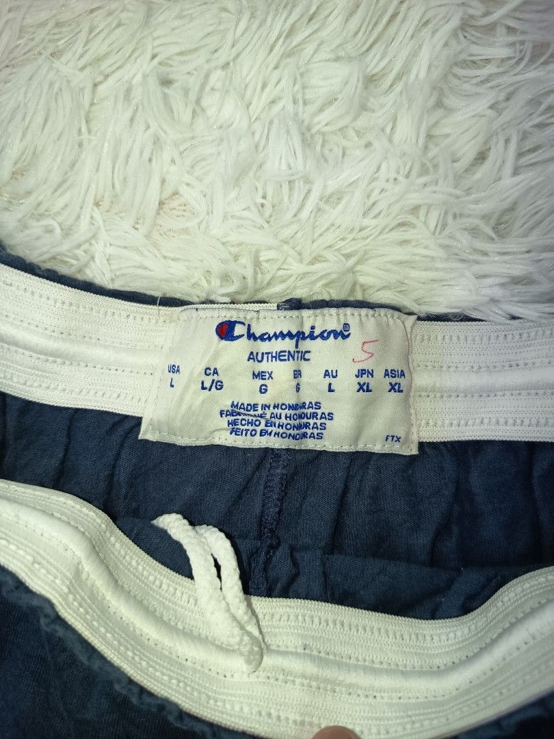 Champion Shorts (Dark Blue) (Category: Shorts) located in Pasay City. Submitted by ODDXX (Listing ID 1463629778, Image 2). Description: Ganda din neto solid promise! Best fit to 31-32 Waist. 199php only add shipping fee ka nlng..