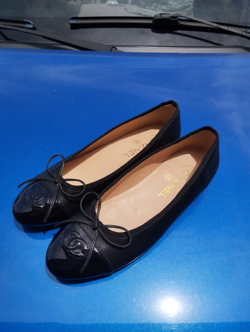 Chanel Black Cap Toe Ballet Flats (Category: Flats & Sandals) located in Candon. Submitted by bernabepradoiii (Listing ID 1463584933, Image 3). Description: - Classic Chanel ballet flats - Color: Black fabric with patent leather cap toe - Detail: Bow on the front - Size: 37C - Origin: Made in Italy - Versatile: Great for everyday wear or dressing up -top grade.