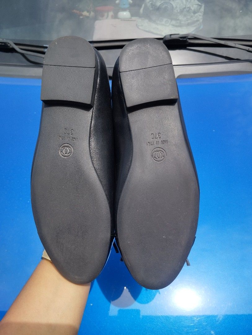 Chanel Black Cap Toe Ballet Flats (Category: Flats & Sandals) located in Candon. Submitted by bernabepradoiii (Listing ID 1463584933, Image 2). Description: - Classic Chanel ballet flats - Color: Black fabric with patent leather cap toe - Detail: Bow on the front - Size: 37C - Origin: Made in Italy - Versatile: Great for everyday wear or dressing up -top grade.