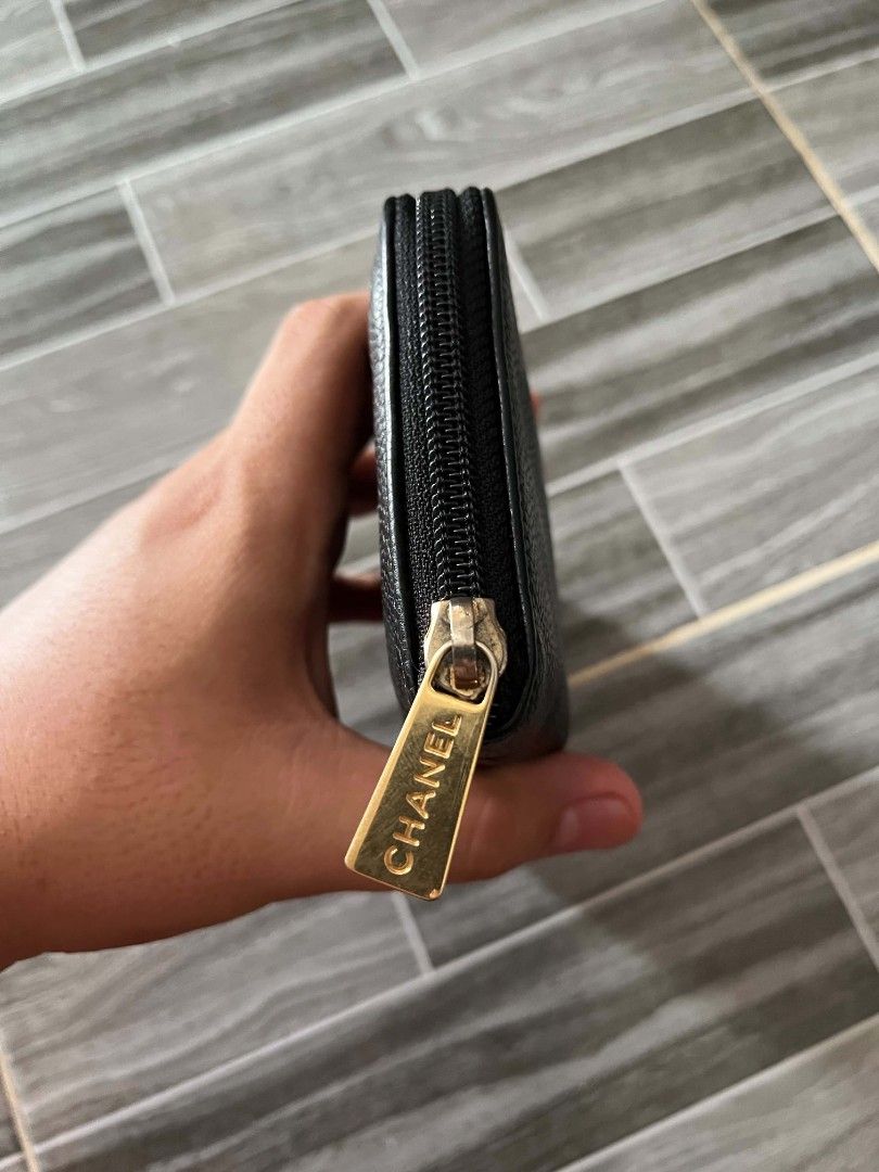 Chanel Black Caviar Leather Zip Around Wallet (Category: Wallets & Card holders) located in Abucay. Submitted by jerlynbal98316 (Listing ID 1463627675, Image 3). Description: - Authentic Chanel wallet - Luxurious black caviar leather - Secure zip-around closure - Elegant gold-tone hardware with CHANEL logo zipper pull - Ample space for cards and cash - A timeless accessory for daily essentials.