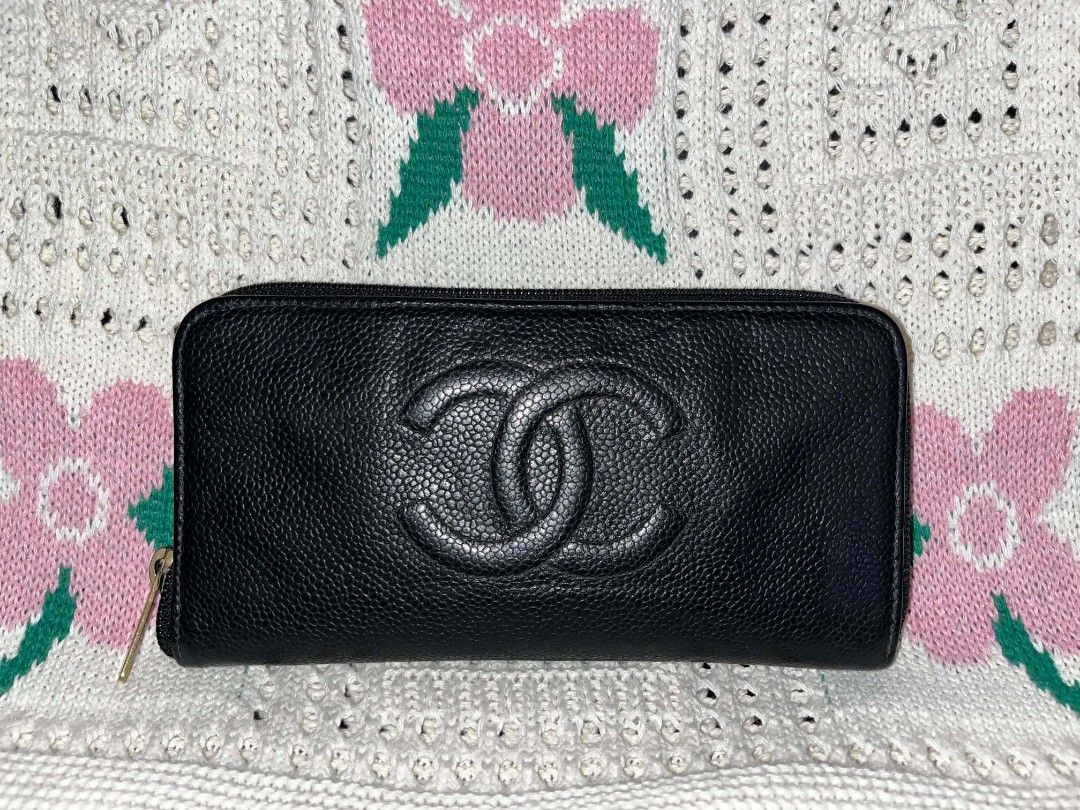Chanel Black Caviar Leather Zip Around Wallet (Category: Wallets & Card holders) located in Abucay. Submitted by jerlynbal98316 (Listing ID 1463627675, Image 1). Description: - Authentic Chanel wallet - Luxurious black caviar leather - Secure zip-around closure - Elegant gold-tone hardware with CHANEL logo zipper pull - Ample space for cards and cash - A timeless accessory for daily essentials.