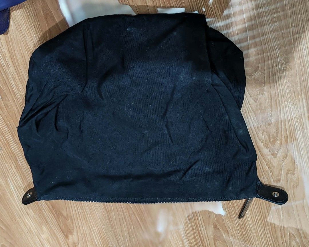 Chanel Black Fabric Bag with Silver Zipper (Category: Luxury Bags & Wallets) located in Baguio. Submitted by solo_ukay (Listing ID 1463694137, Image 1). Description: - Stylish black fabric bag - Smooth-working silver zipper with authentic Chanel branding - Branded zipper pull for added detail - Ideal for casual, everyday use - Perfect size for carrying your daily essentials.