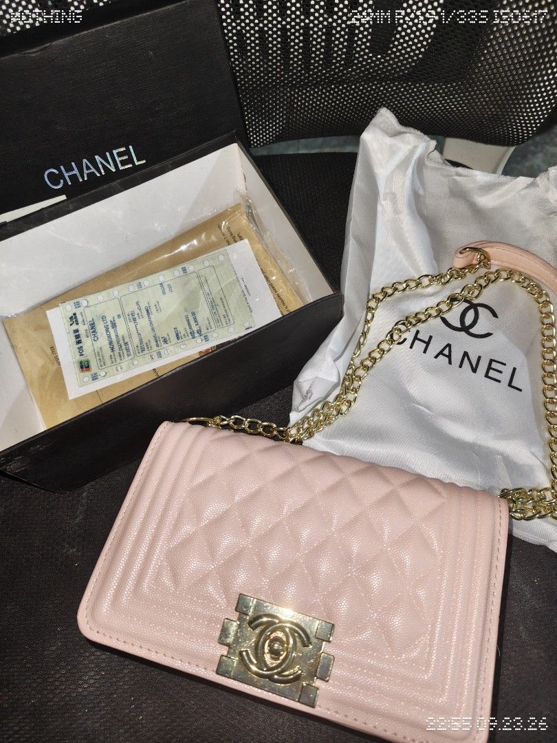 Chanel Pink Quilted Wallet on Chain Bag (Category: Luxury Bags & Wallets) located in Paranaque City. Submitted by miyauniversal (Listing ID 1463699220, Image 2). Description: Selling a Chanel pink wallet on chain bag. Comes with box and dust bag. Gold chain strap. Quilted exterior with CC logo hardware. Great for nights out or everyday use..