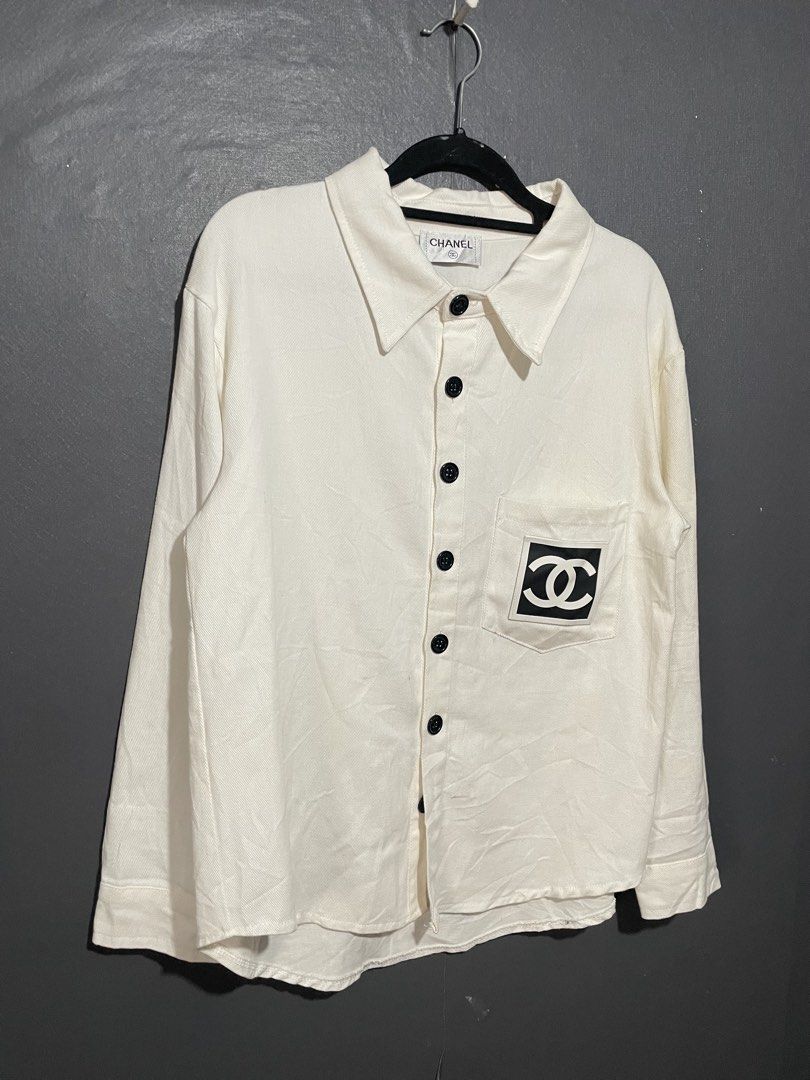 Chanel Rubber Logo Button-down Longsleeves (Category: Luxury Apparel) located in Manila. Submitted by claii_collection (Listing ID 1463666266, Image 1). Description: Chanel Rubber Logo Button-down Longsleeves - 22x28 - Excellent Condition - Chanel necktags.