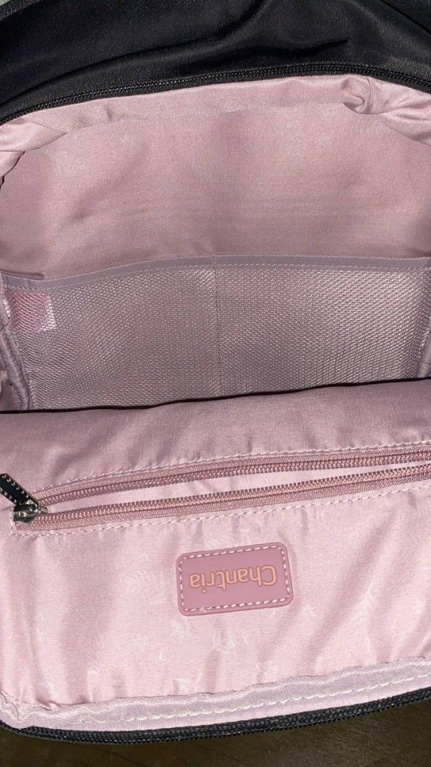 CHANTRIA BACKPACK (Category: Backpacks) located in Manila. Submitted by swifttree.c6cdcf (Listing ID 1463706779, Image 3). Description: - Brand: Chantria - Color: Black nylon exterior - Interior: Light pink lining with multiple compartments - Pockets: Front zip pocket, side pockets - Hardware: Gold details - Condition: Brand new with original tags attached ‎FS: CHANTRIA BACKPACK — ₱850 ONLY! ‎original price: ₱1,400 ‎ ‎condition: never used / in v