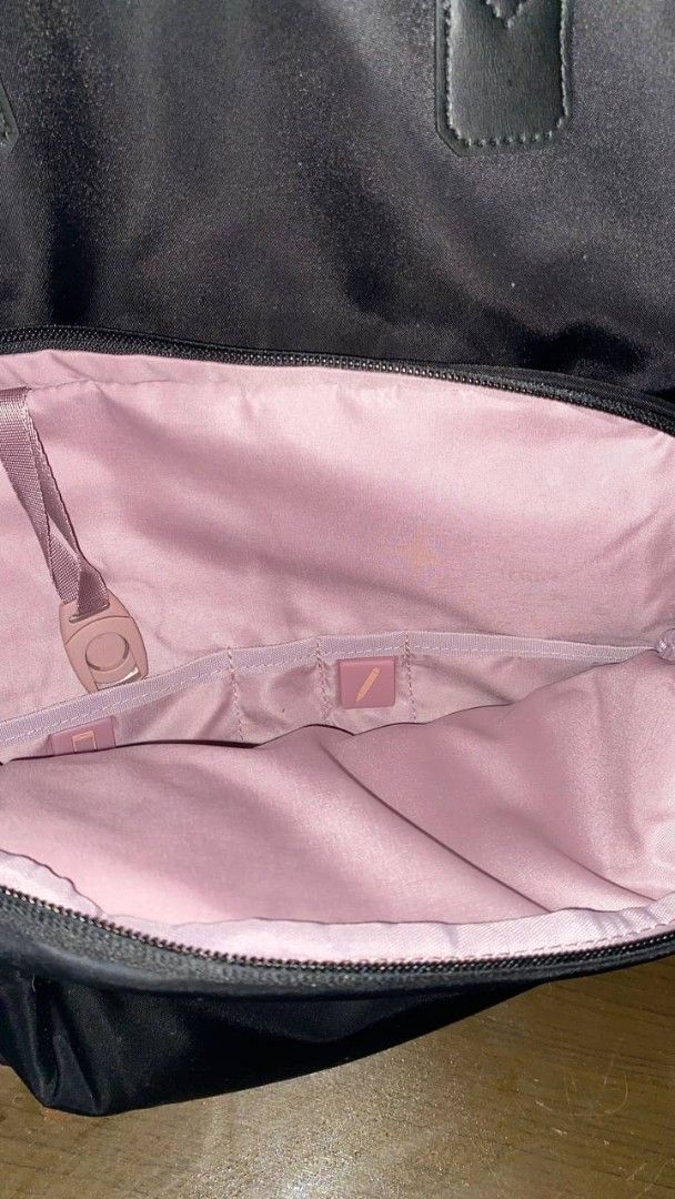 CHANTRIA BACKPACK (Category: Backpacks) located in Manila. Submitted by swifttree.c6cdcf (Listing ID 1463706779, Image 2). Description: - Brand: Chantria - Color: Black nylon exterior - Interior: Light pink lining with multiple compartments - Pockets: Front zip pocket, side pockets - Hardware: Gold details - Condition: Brand new with original tags attached ‎FS: CHANTRIA BACKPACK — ₱850 ONLY! ‎original price: ₱1,400 ‎ ‎condition: never used / in v