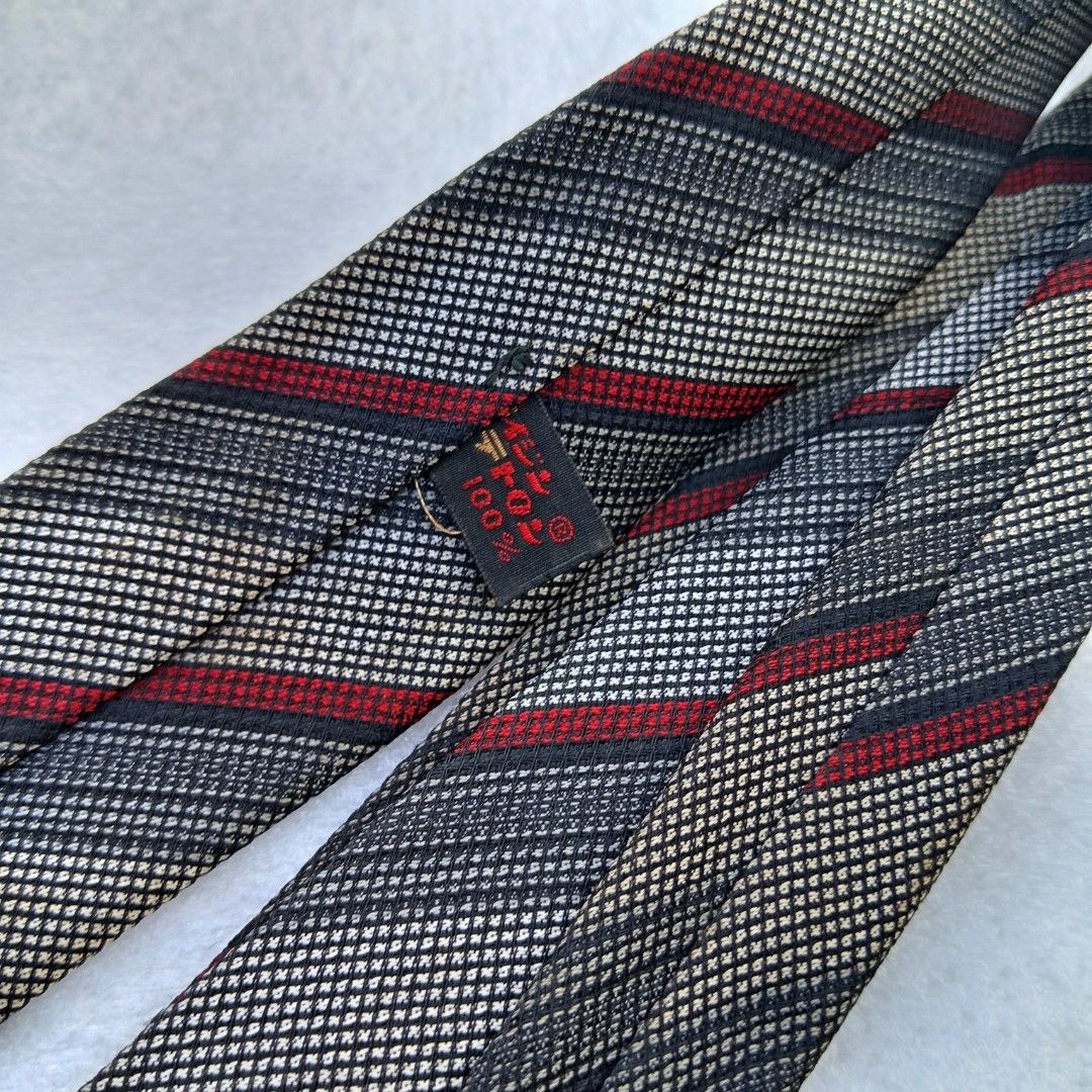 Charcoal & Red Textured Striped necktie (Category: Ties) located in Abucay. Submitted by gibzzz123 (Listing ID 1463573932, Image 3). Description: • All items are ON HAND and ready to be shipped/picked up. • Items are preloved/ukay, so please expect minimal signs of usage unless stated otherwise. • No major issues — good condition unless otherwise indicated in the listing. • Actual color may slightly vary due to lighting and screen settings. • All