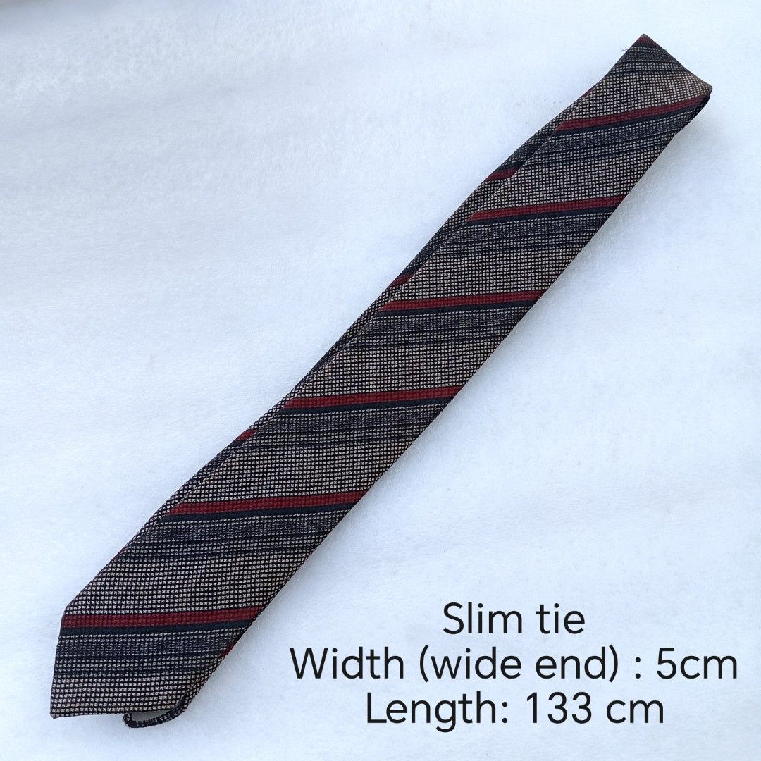 Charcoal & Red Textured Striped necktie (Category: Ties) located in Abucay. Submitted by gibzzz123 (Listing ID 1463573932, Image 2). Description: • All items are ON HAND and ready to be shipped/picked up. • Items are preloved/ukay, so please expect minimal signs of usage unless stated otherwise. • No major issues — good condition unless otherwise indicated in the listing. • Actual color may slightly vary due to lighting and screen settings. • All
