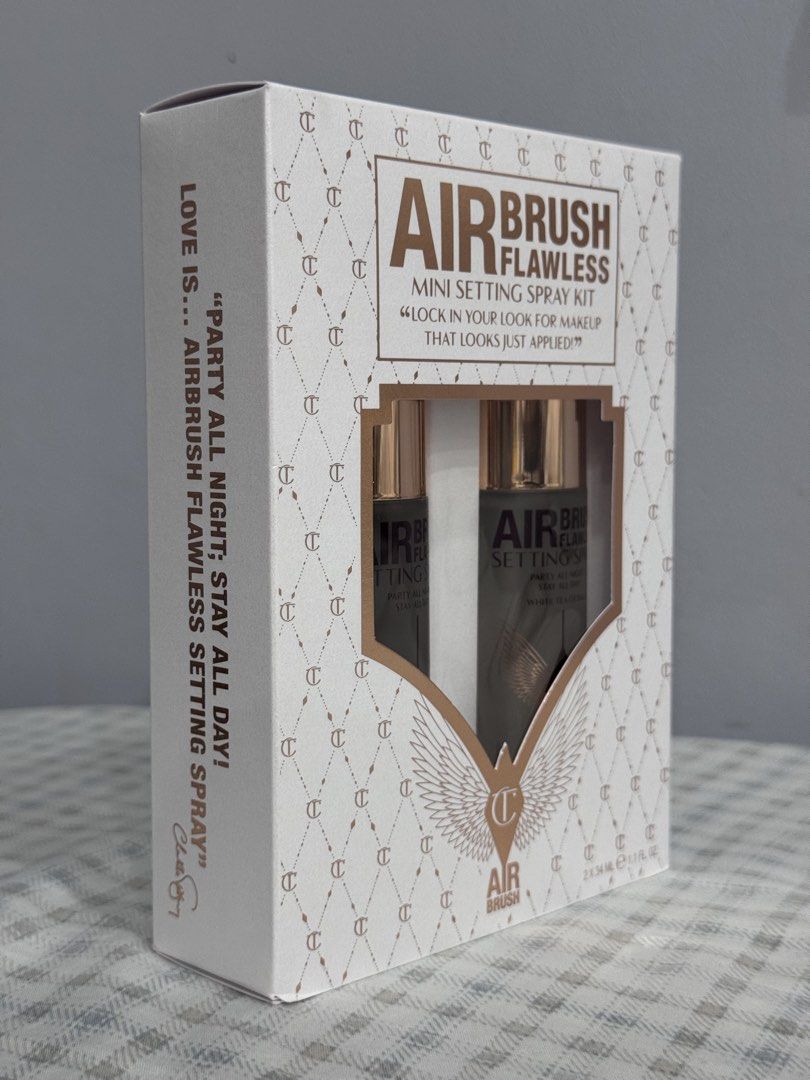 Charlotte Tilbury Airbrush Flawless Mini Setting Spray Kit (Category: Makeup) located in Manila. Submitted by altabl123 (Listing ID 1463710025, Image 3). Description: - Achieve an airbrushed look that lasts all day and night. - Mini kit includes two setting sprays: 'Party All Night, Stay All Day!' and 'White Tea of Bali'. - Locks in makeup for up to 16 hours. - Prevents melting, fading, and creasing. - For best results, hold 6-8 inches from face 