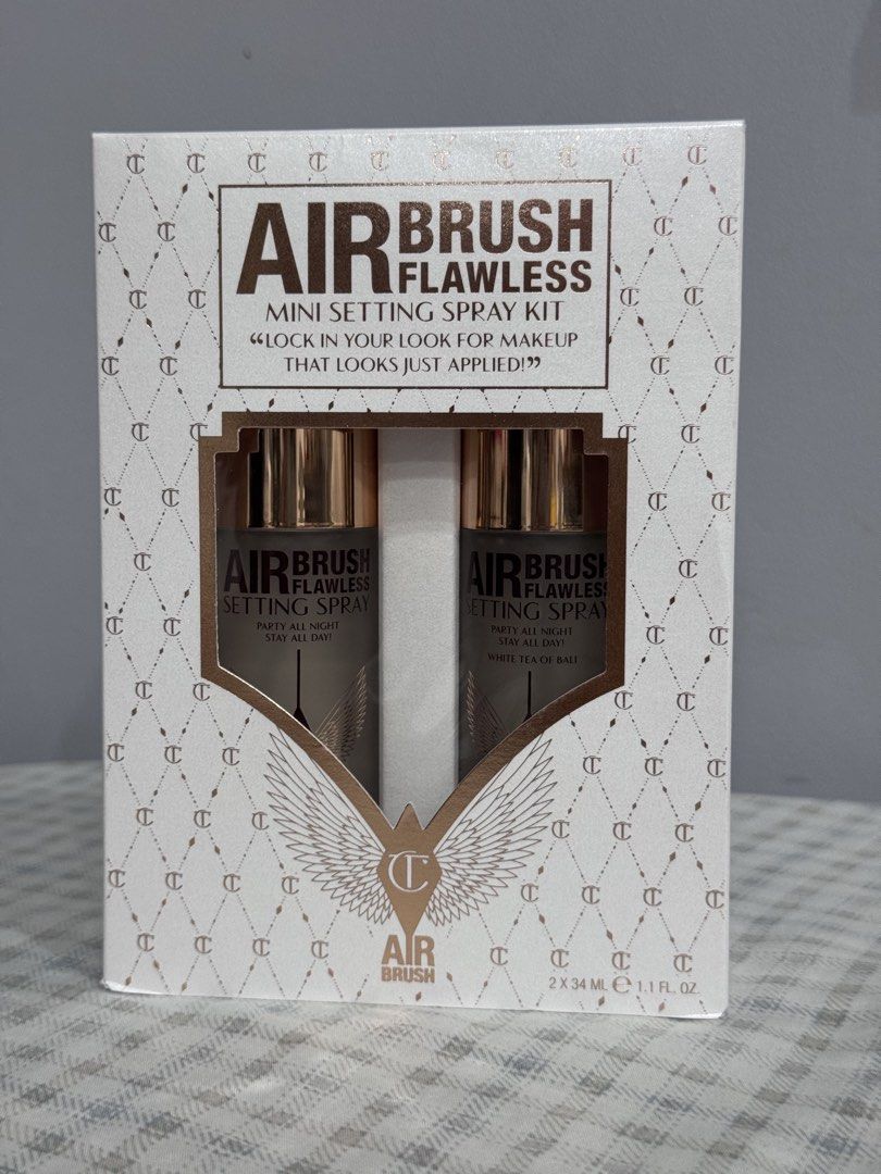 Charlotte Tilbury Airbrush Flawless Mini Setting Spray Kit (Category: Makeup) located in Manila. Submitted by altabl123 (Listing ID 1463710025, Image 1). Description: - Achieve an airbrushed look that lasts all day and night. - Mini kit includes two setting sprays: 'Party All Night, Stay All Day!' and 'White Tea of Bali'. - Locks in makeup for up to 16 hours. - Prevents melting, fading, and creasing. - For best results, hold 6-8 inches from face 