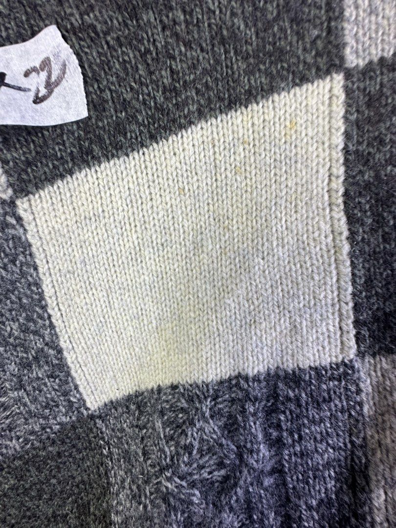 Checkerboard Knit Sweater Grey Black White (Category: Longsleeves) located in Manila. Submitted by declutterpromax (Listing ID 1463607852, Image 2). Description: - Grey, black, and white checkerboard knit sweater - Long sleeves and crew neck - Features some light marks on the front (please check photos) - Material feels soft and warm - Perfect for layering or wearing solo - Unique and eye-catching pattern.
