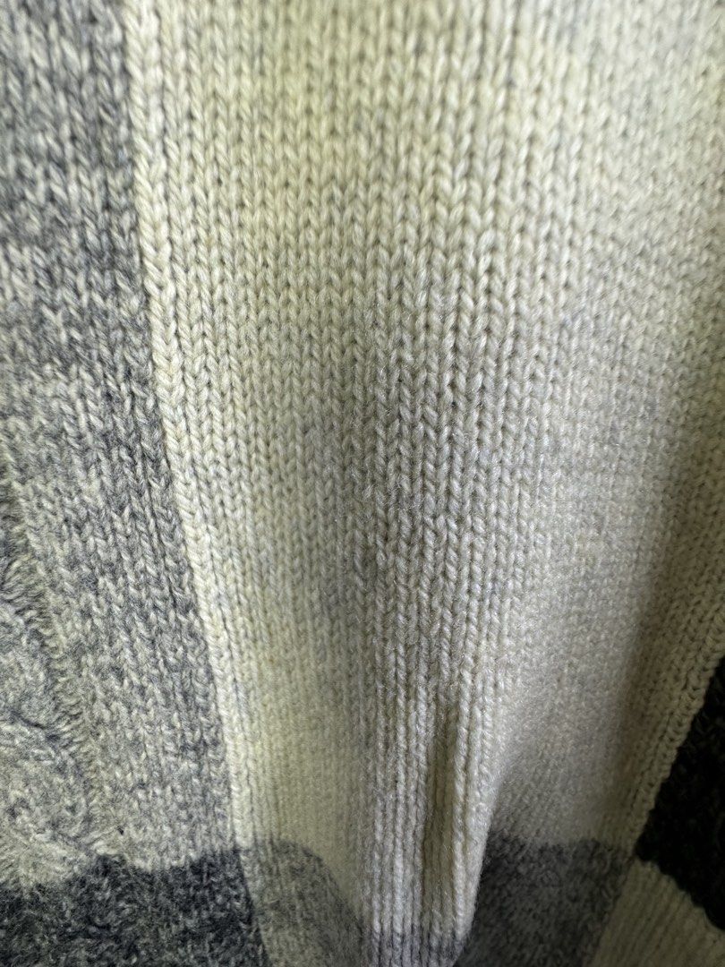 Checkerboard Knit Sweater Grey Black White (Category: Longsleeves) located in Manila. Submitted by declutterpromax (Listing ID 1463607852, Image 3). Description: - Grey, black, and white checkerboard knit sweater - Long sleeves and crew neck - Features some light marks on the front (please check photos) - Material feels soft and warm - Perfect for layering or wearing solo - Unique and eye-catching pattern.