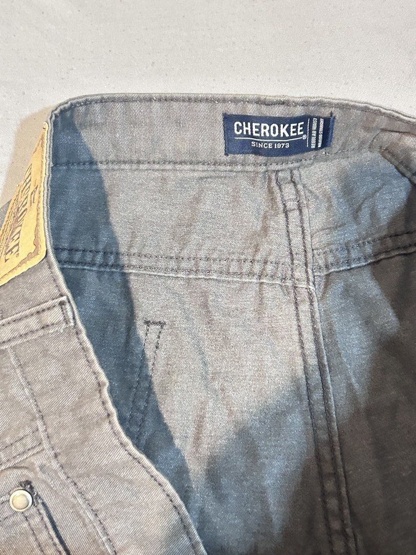 Cherokee Men's Grey Shorts Size W42 (Category: Shorts) located in Santa Rosa. Submitted by rei.accessories (Listing ID 1463738797, Image 2). Description: - Grey Cherokee shorts - Size: W42 - Fit: Regular - Style: Casual wear - Features: Front and back pockets, button and zip closure.