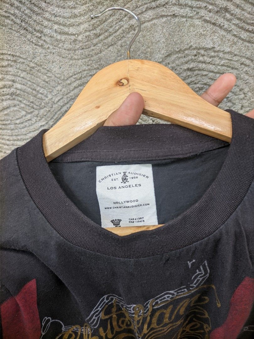 CHRISTIAN AUDIGER TEE (Category: Activewear) located in Tayug. Submitted by lowballer_2 (Listing ID 1463701287, Image 3). Description: 22.5 W 30 L 9/10 COLOR RATE NO ISSUE COMPLETE TAGS .