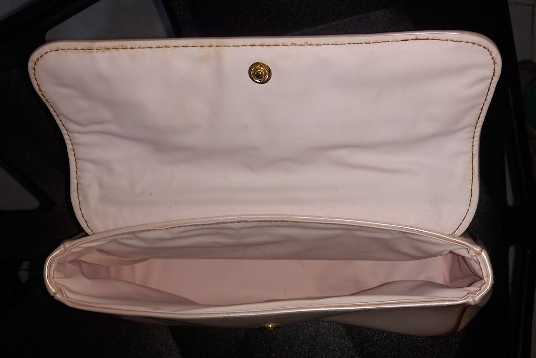 Christian Dior Perfume Cosmetic Bag Pouch (Category: Purses & Pouches) located in Cagayan de Oro. Submitted by edwardryan01984 (Listing ID 1463690404, Image 3). Description: - Authentic Christian Dior cosmetic pouch - Color: Pink and champagne - Hardware: Gold with "Parfums Christian Dior" logo - Closure: Snap button - Interior: Clean - Exterior: Minor marks present - Ideal for travel or everyday use.