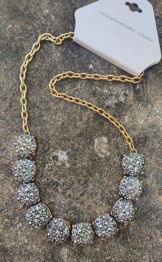 Christopher & Banks Gold Chain Necklace with Sparkly Pendants (Category: Necklaces) located in Bacolod City. Submitted by jewels.of.joy (Listing ID 1463673421, Image 1). Description: - Gold chain necklace from Christopher & Banks - Features round pendants adorned with sparkly stones - Classic link chain style - Ideal for elevating your everyday or special occasion outfits.