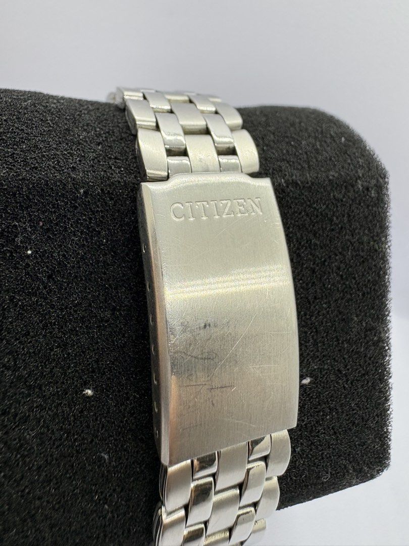 Citizen Eco-Drive Junction Water Resist Watch (Category: Men's Watches) located in Quezon City. Submitted by rentoti (Listing ID 1463620080, Image 3). Description: - Citizen Eco-Drive watch - Junction model - Water resistant - Stainless steel band and case - Grey dial with gold accents - Shows some signs of wear on band and case - Powered by light (Eco-Drive technology).