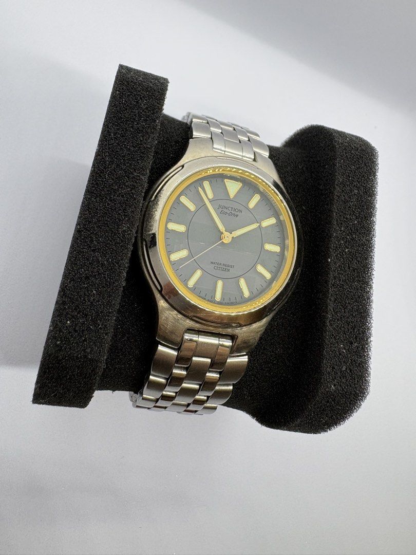 Citizen Eco-Drive Junction Water Resist Watch (Category: Men's Watches) located in Quezon City. Submitted by rentoti (Listing ID 1463620080, Image 2). Description: - Citizen Eco-Drive watch - Junction model - Water resistant - Stainless steel band and case - Grey dial with gold accents - Shows some signs of wear on band and case - Powered by light (Eco-Drive technology).