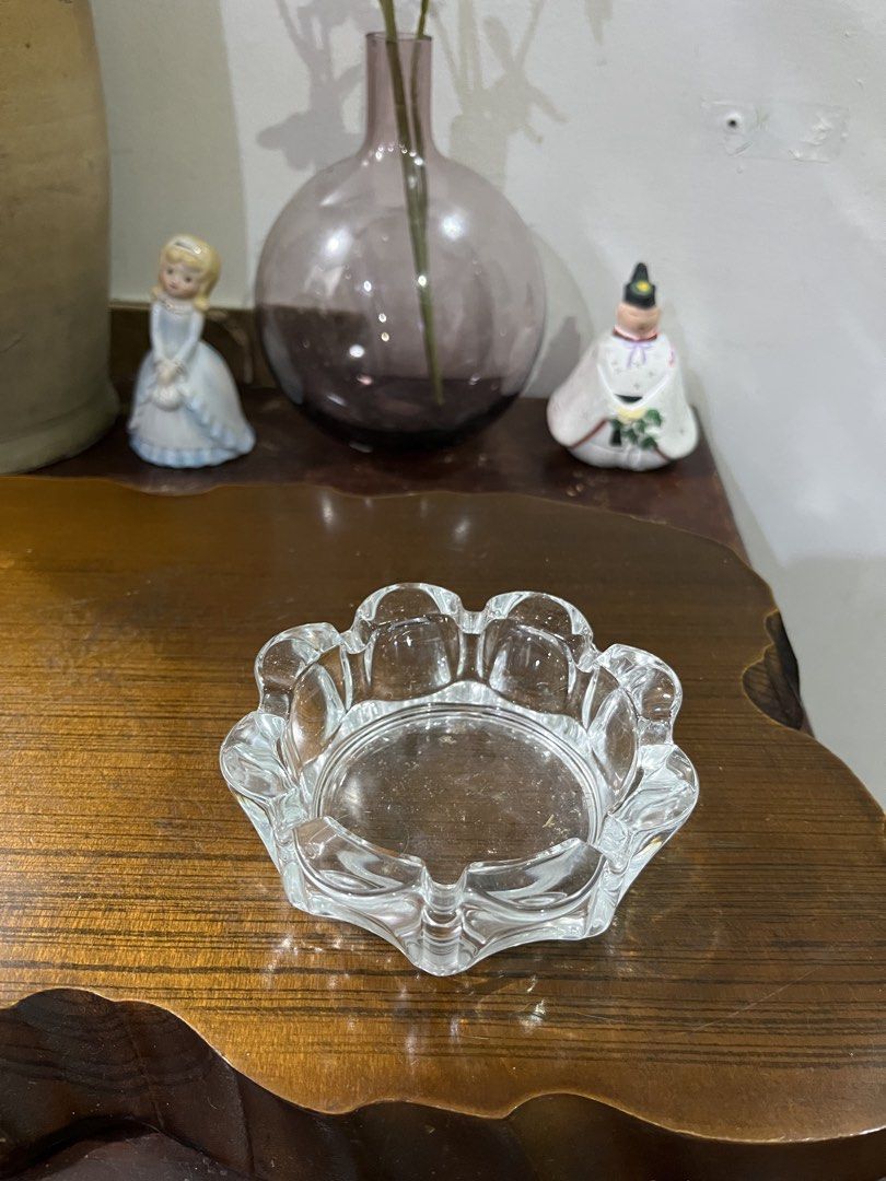 Clear Glass Ashtray with Scalloped Edge (Category: Vases & Decorative Bowls) located in Taguig. Submitted by minmin_parker (Listing ID 1463696424, Image 1). Description: - Beautiful glass ashtray with a delicate scalloped edge. - Compact size, perfect for a few cigarettes or as a decorative piece. - Ideal for placement on small tables or desks. - Clean and ready for immediate use..