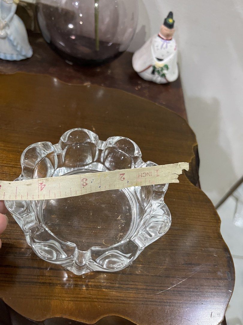 Clear Glass Ashtray with Scalloped Edge (Category: Vases & Decorative Bowls) located in Taguig. Submitted by minmin_parker (Listing ID 1463696424, Image 3). Description: - Beautiful glass ashtray with a delicate scalloped edge. - Compact size, perfect for a few cigarettes or as a decorative piece. - Ideal for placement on small tables or desks. - Clean and ready for immediate use..