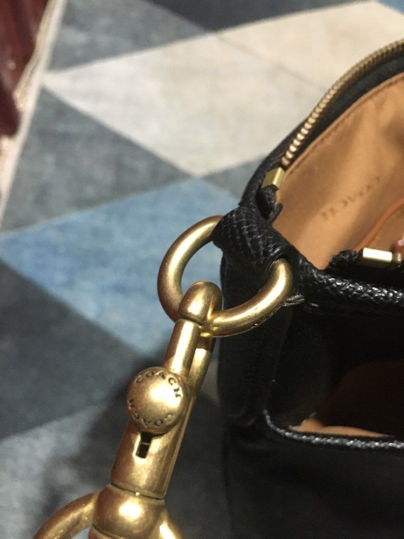 Coach Black Leather Crossbody Bag (Category: Luxury Bags & Wallets) located in Ozamiz City. Submitted by kkaier7777 (Listing ID 1463585520, Image 2). Description: - Authentic Coach black leather crossbody bag - Gold hardware details - Front pocket and zip closure - Adjustable strap for comfort - Ideal for everyday use.