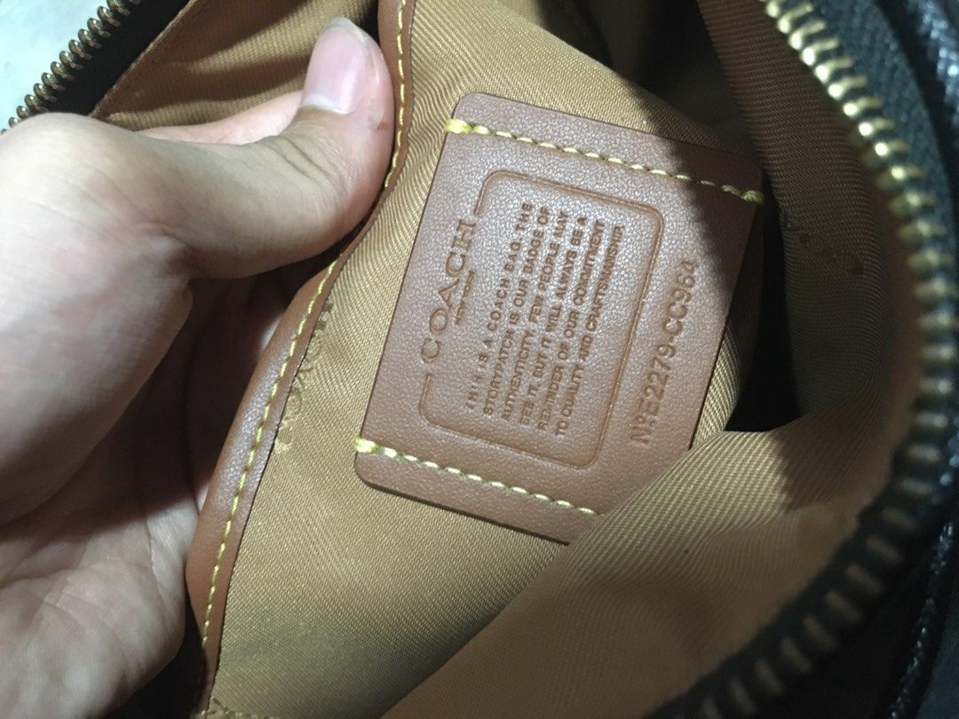 Coach Black Leather Crossbody Bag (Category: Luxury Bags & Wallets) located in Ozamiz City. Submitted by kkaier7777 (Listing ID 1463585520, Image 3). Description: - Authentic Coach black leather crossbody bag - Gold hardware details - Front pocket and zip closure - Adjustable strap for comfort - Ideal for everyday use.