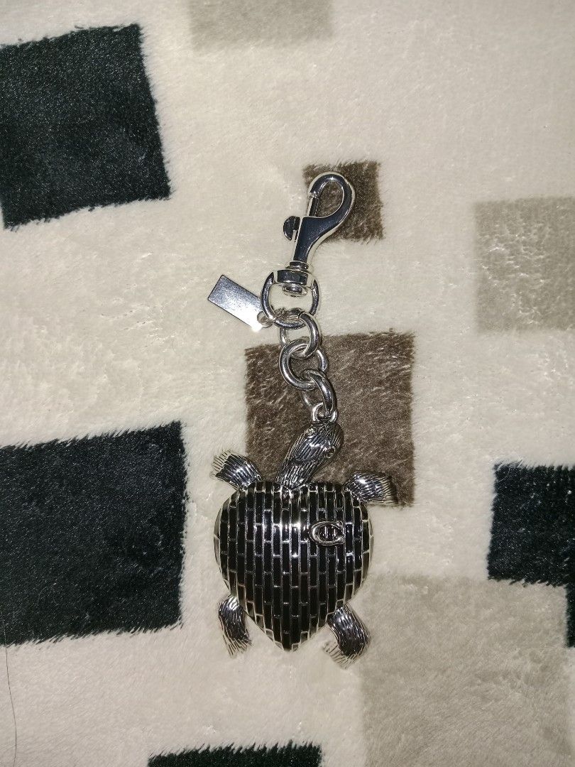 coach black turtle charm (Category: Craft Supplies & Tools) located in Baguio. Submitted by aurumsie (Listing ID 1463628381, Image 1). Description: insp*red silver hardware.