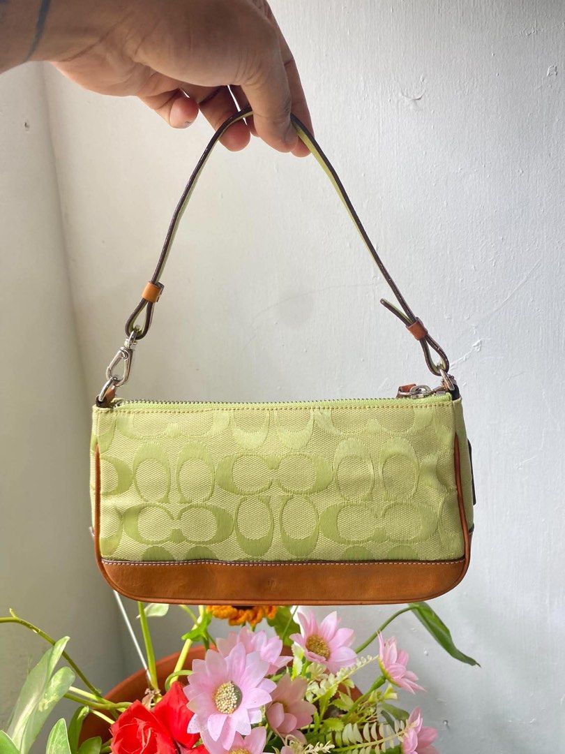 coach demi lime green rare colorway (Category: Purses & Pouches) located in Cebu City. Submitted by gummybearsworld (Listing ID 1463693864, Image 1). Description: rank a no issue rare colorway latest sold on ebay is 12-14k while lowest sold is in very used condition.