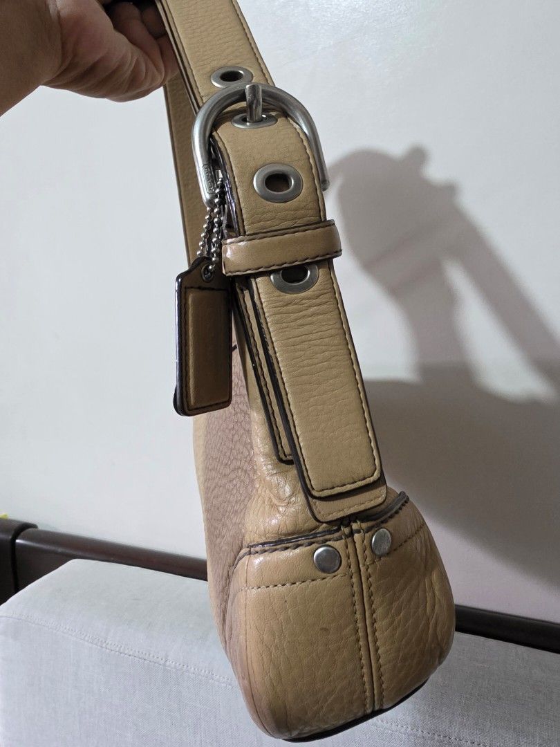 Coach Leather Shoulder Bag Tan (Category: Luxury Bags & Wallets) located in Santo Tomas. Submitted by kendra_04 (Listing ID 1463611366, Image 2). Description: Coach tan leather shoulder bag. Pebbled leather, zipper closure, interior pockets, silver hardware, and Coach tag. Perfect for daily use..