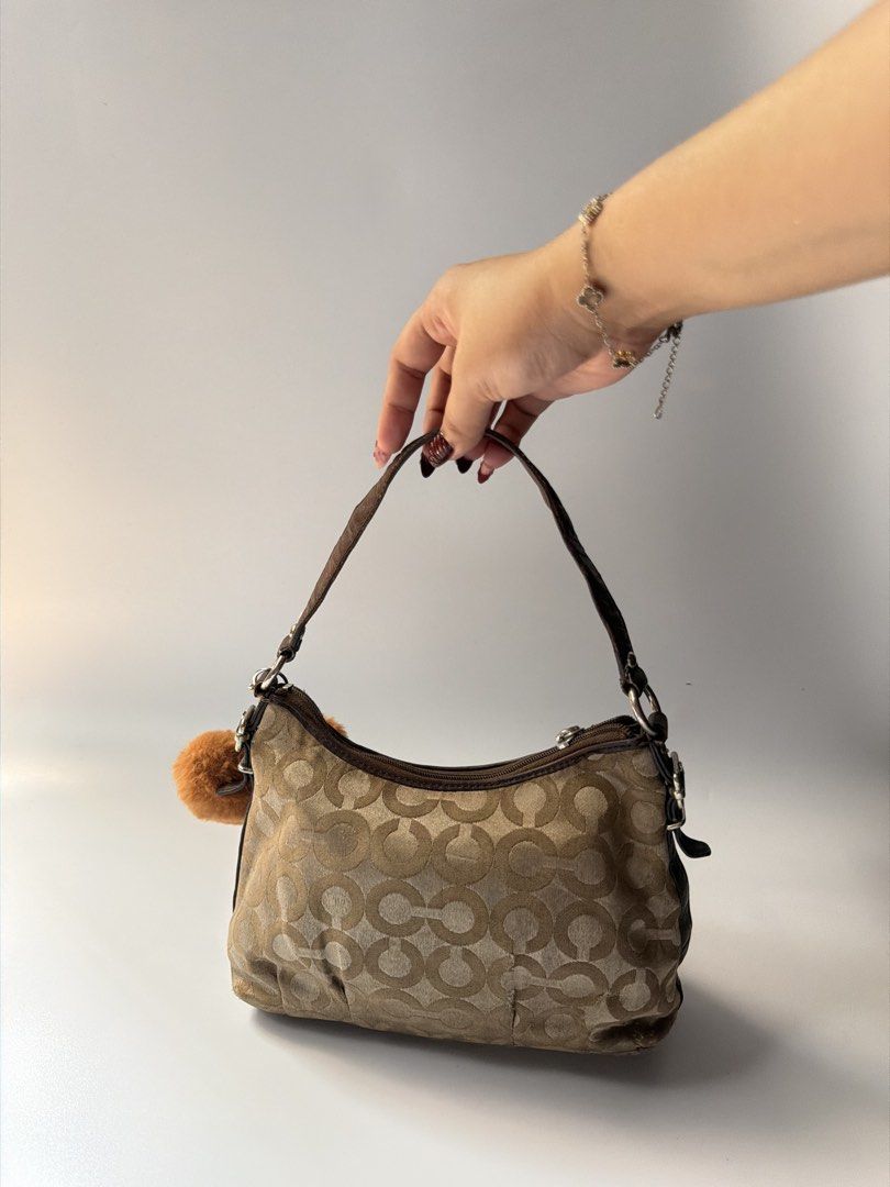 Coach Madison Dotted Op Art Mini Shoulder Bag (Category: Shoulder Bags) located in Mandaluyong City. Submitted by n444m (Listing ID 1463611276, Image 2). Description: Coach Madison Dotted Op Art Mini Shoulder Bag -kili bag -has signs of usage -still negotiable -w free char .