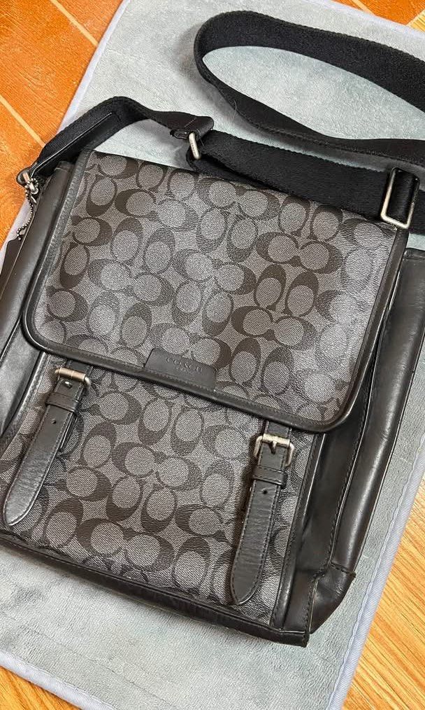 Coach Messenger Bag for Men (Category: Sling Bags) located in Legazpi City. Submitted by shlqr (Listing ID 1463686602, Image 1). Description: Black Coach Signature Monogram Messenger Bag 𝙨𝙞𝙯𝙚 & 𝙙𝙞𝙢𝙚𝙣𝙨𝙞𝙤𝙣: Large size (can fit a notebook and umbrella) 𝙙𝙚𝙩𝙖𝙞𝙡𝙨: • flap front with dual strap details • leather and canvas material • adjustable length • no rust on the hardware • NO MAJOR FLAW! Still in good and manageable condition 𝗣