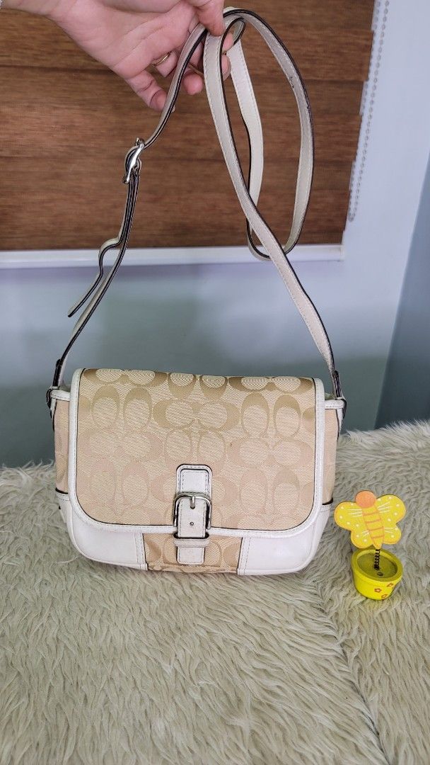 Coach Monogram Canvas & Leather Shoulder Bag (Category: Luxury Bags & Wallets) located in Cavite. Submitted by amairos (Listing ID 1463591104, Image 1). Description: - Classic Coach bag good condition no major flaws - .