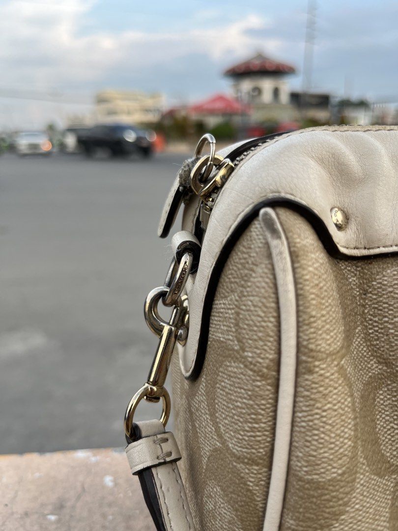 Coach Monogram Canvas Leather Trim Satchel Bag (Category: Luxury Bags & Wallets) located in General Santos City (Dadiangas). Submitted by bornstiborns (Listing ID 1463642230, Image 3). Description: - Coach monogram leather satchel bag - Color: Beige and cream - Material: Leather trim and handles - Features: Detachable shoulder strap, zipper closure - Origin: Made in the Philippines - Ideal for: Everyday use.