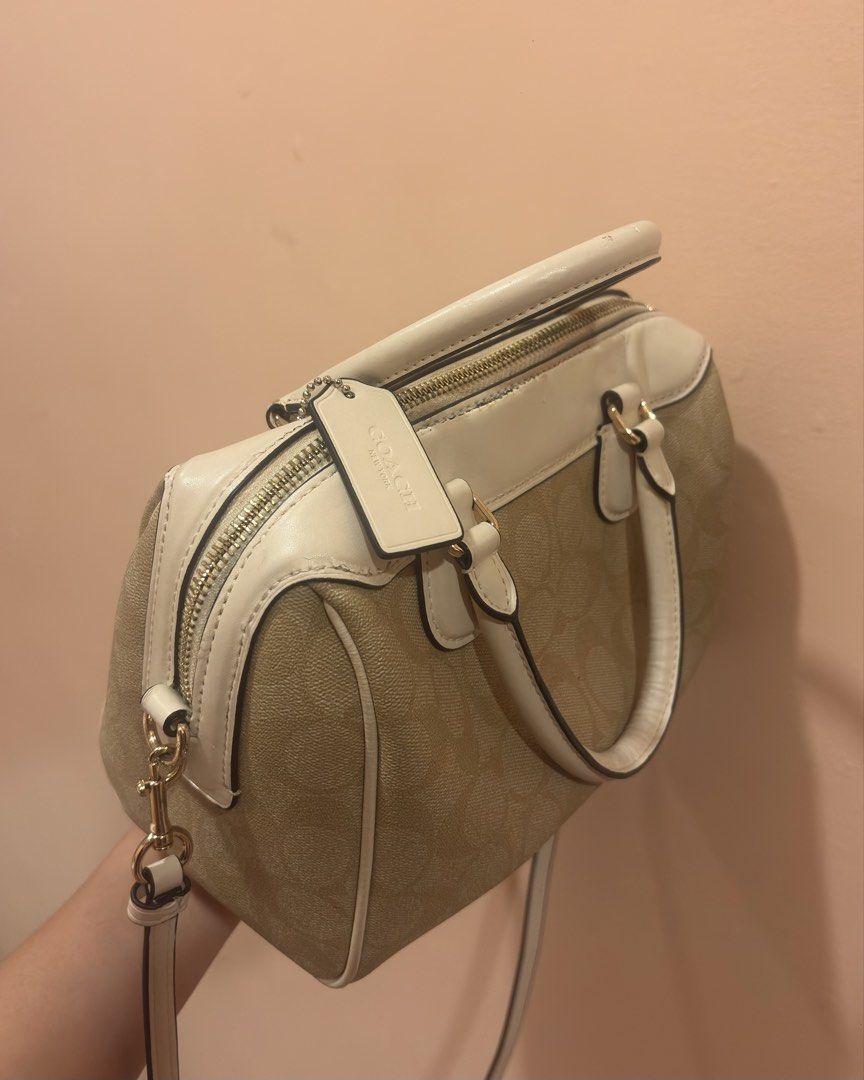 Coach Monogram Canvas Leather Satchel Bag (Category: Luxury Bags & Wallets) located in Legazpi City. Submitted by closetbyandyyy (Listing ID 1463676008, Image 3). Description: very pretty bag has minor flaws ( can be seen sa pictures ) RFS: decluttering .