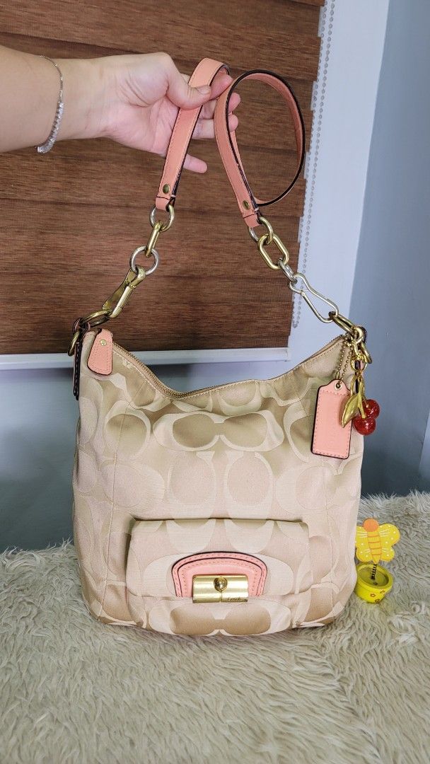 Coach Monogram Canvas Shoulder Bag with Leather Trim (Category: Luxury Bags & Wallets) located in Cavite. Submitted by amairos (Listing ID 1463591636, Image 1). Description: - Authentic Coach shoulder bag in classic monogram canvas. - good condition no major flaws.