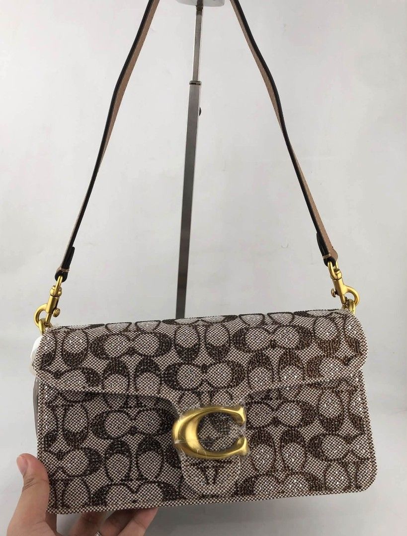 Coach Tabby26 Crystal Shoulder Bag (Category: Shoulder Bags) located in Manila. Submitted by msddirectfactoryoutlet (Listing ID 1463670085, Image 2). Description: Tabby26 Crystal Medium 10 1/4" (L) x 6" (H) x 3" (W).
