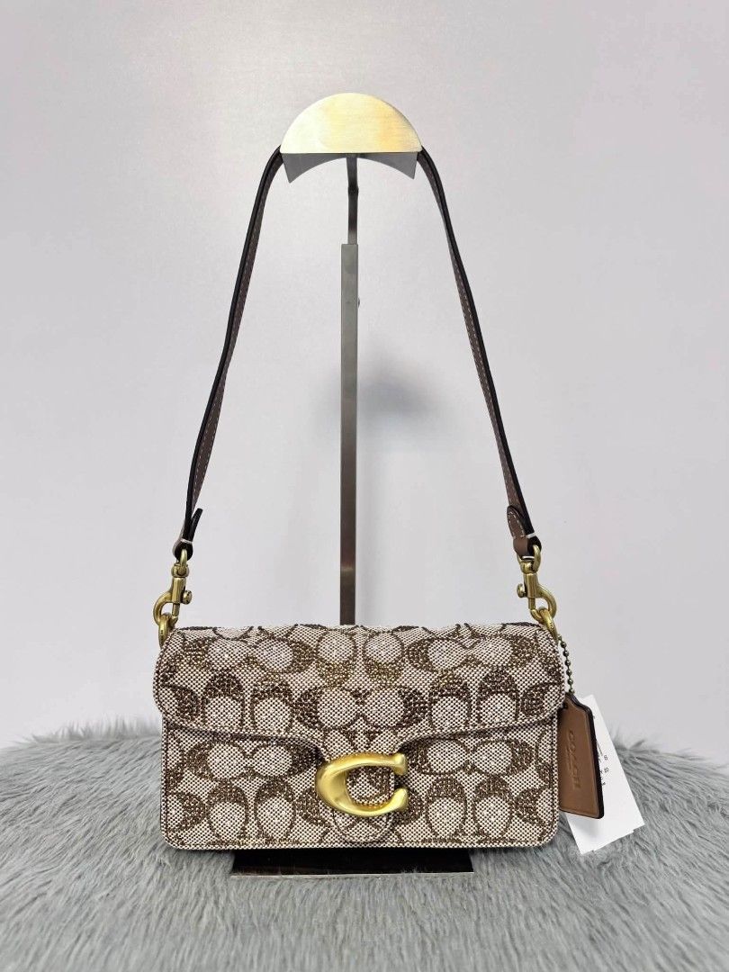 Coach Tabby 20 in Crystal Signature (Category: Shoulder Bags) located in Quezon City. Submitted by bagsboutiqueph (Listing ID 1463684479, Image 1). Description: LAST PRICE POSTED. LIMITED STOCKS! BRANDNEW WITH INCLUSIONS. COLOR MAY SLIGHTLY VARY IN ACTUAL DUE TO LIGHTING AND CAMERA SETTING. OTHER PHOTOS WILL BE SEND DURING PURCHASE AND FOR SURE BUYERS ONLY. WHEN IN DOUBT, DO NOT ORDER. THANK YOU..