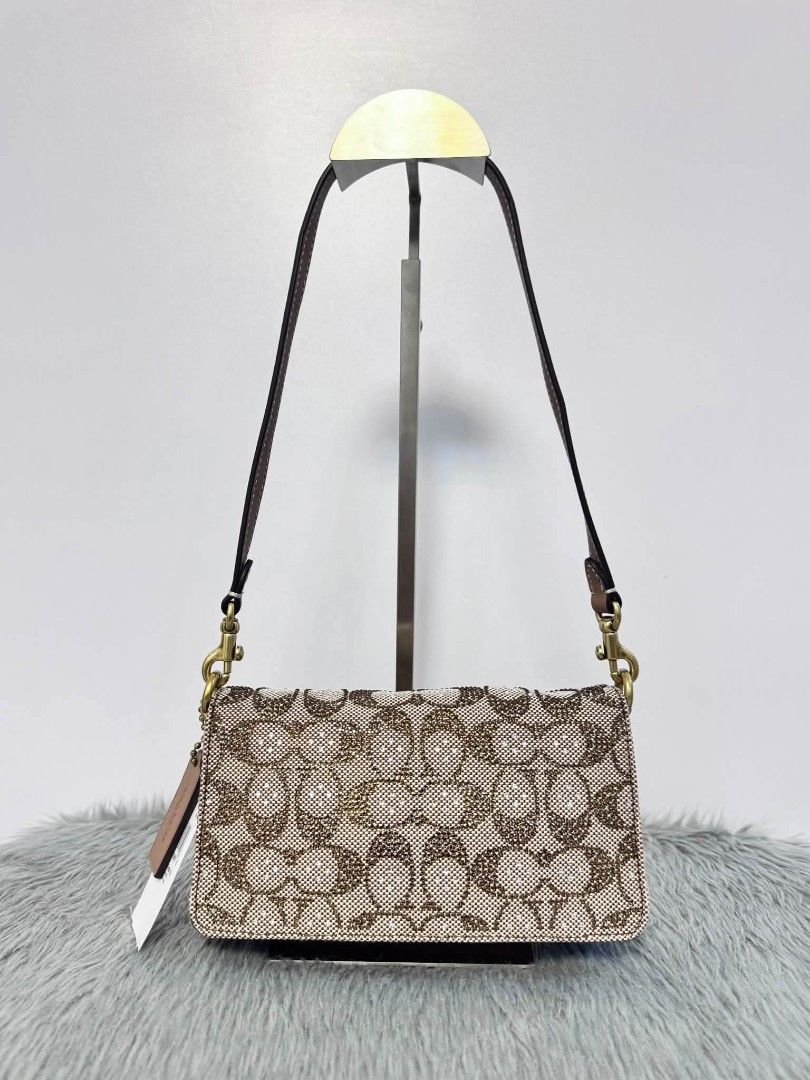 Coach Tabby 20 in Crystal Signature (Category: Shoulder Bags) located in Quezon City. Submitted by bagsboutiqueph (Listing ID 1463684479, Image 3). Description: LAST PRICE POSTED. LIMITED STOCKS! BRANDNEW WITH INCLUSIONS. COLOR MAY SLIGHTLY VARY IN ACTUAL DUE TO LIGHTING AND CAMERA SETTING. OTHER PHOTOS WILL BE SEND DURING PURCHASE AND FOR SURE BUYERS ONLY. WHEN IN DOUBT, DO NOT ORDER. THANK YOU..